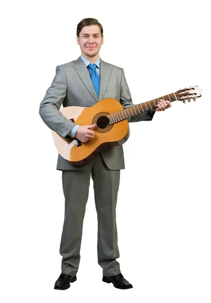 Jovem empresário tocando guitarra — Fotografia de Stock