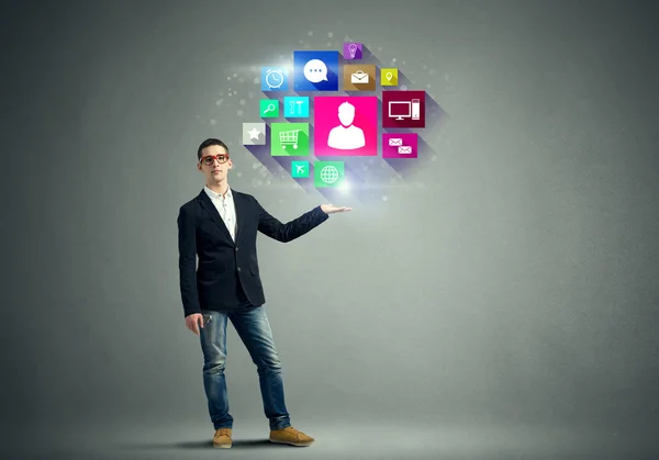 Man presenting  social networking icons — Stock Photo, Image