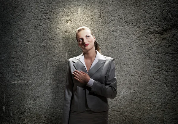 Santa mulher de negócios com luz — Fotografia de Stock