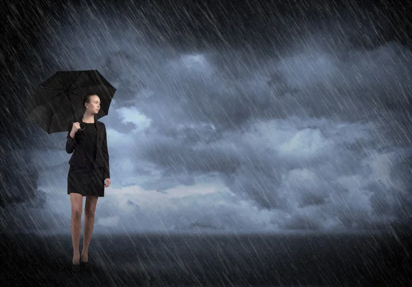 Joven mujer de negocios con paraguas —  Fotos de Stock