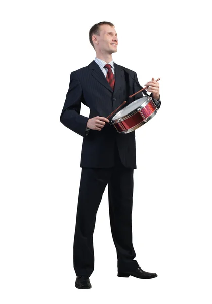 Businessman playing drums — Stock Photo, Image