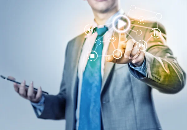 Businessman hand touching media screen — Stock Photo, Image