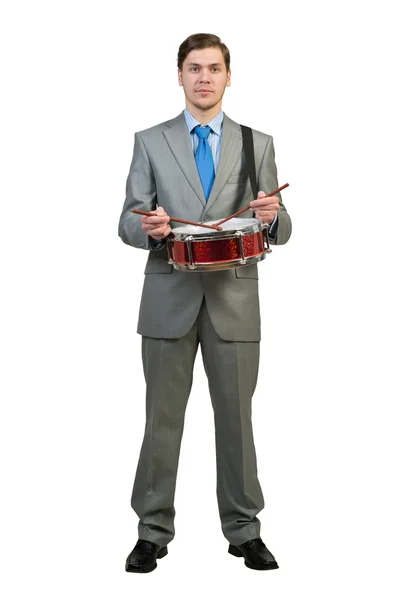 Забавный бизнесмен играет на барабанах — стоковое фото
