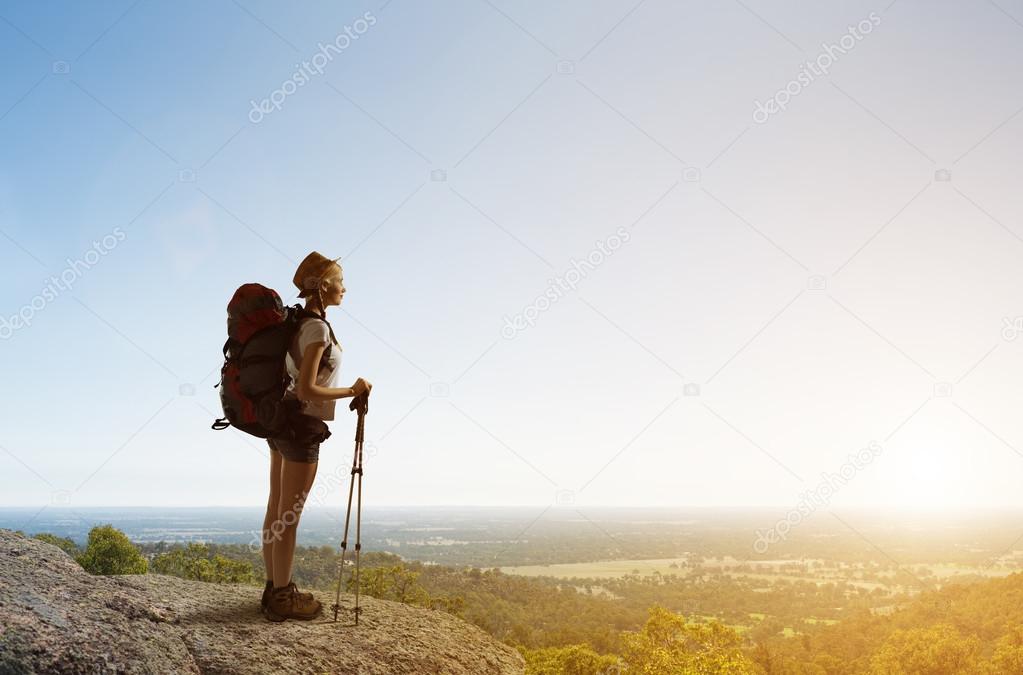 woman hiker walking in mountain