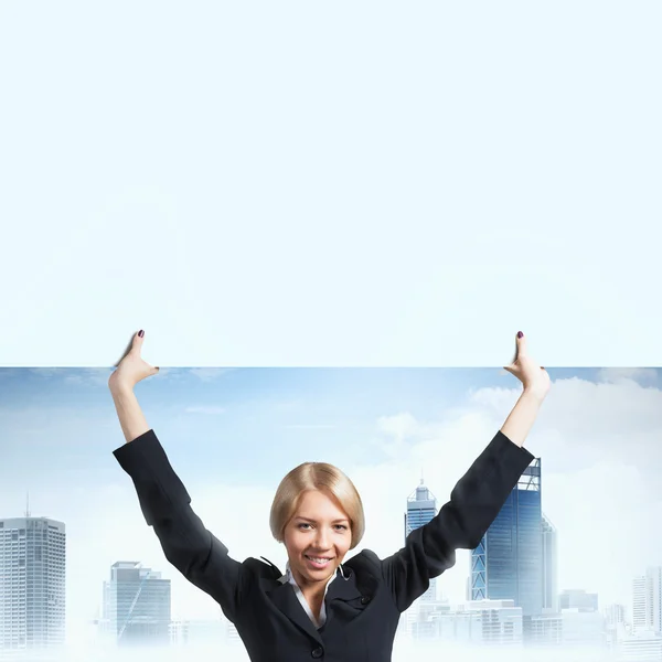 Businesswoman with white blank — Stock Photo, Image