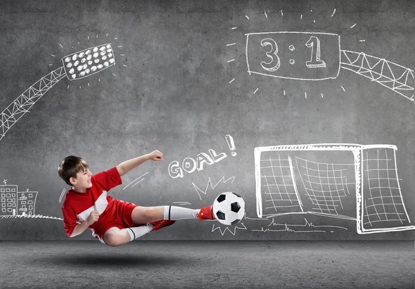 Ragazzo che gioca a calcio — Foto Stock