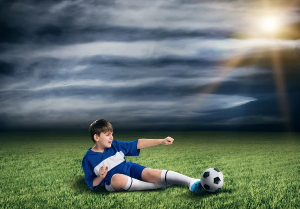 Fotbollsspelare på stadium — Stockfoto