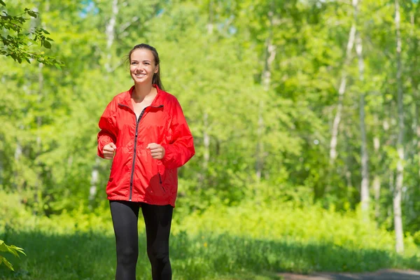 Female athlete running — Stock Photo, Image