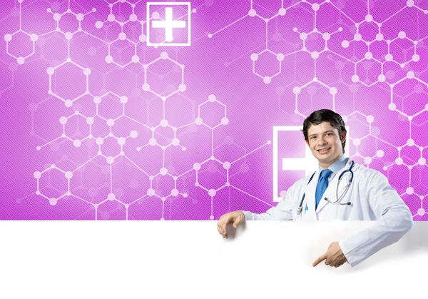 Medico con banner in bianco — Foto Stock