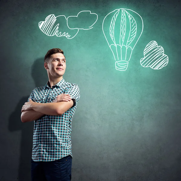 Man in casual and drawn aerostat — Stock Photo, Image