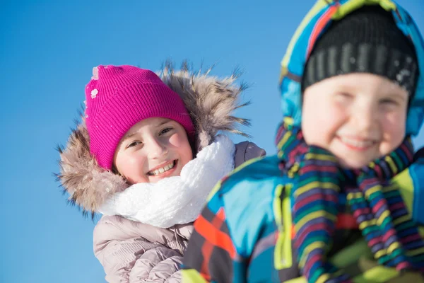 Kids riding sled — Stock Photo, Image