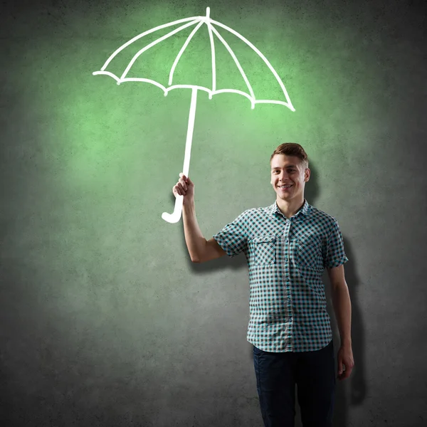 Man holding drawn umbrella — Stock Photo, Image