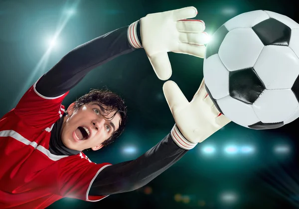 Goalkeeper in catching ball — Stock Photo, Image