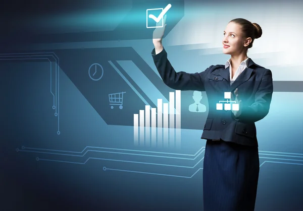 Businesswoman with virtual panel — Stock Photo, Image