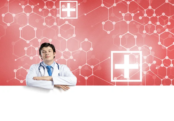 Medico con banner in bianco — Foto Stock