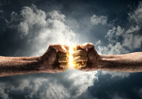 Two fists hitting each other — Stock Photo, Image