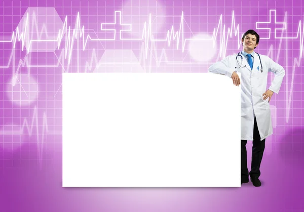 Doctor con banner en blanco — Foto de Stock