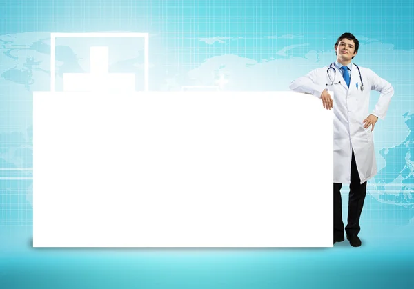 Doutor com banner em branco — Fotografia de Stock