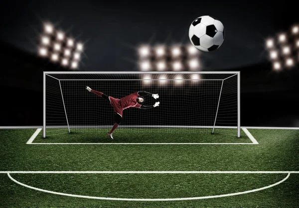 Goalkeeper in gates jumping — Stock Photo, Image