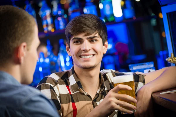 Young man at the bar — Stock Photo, Image