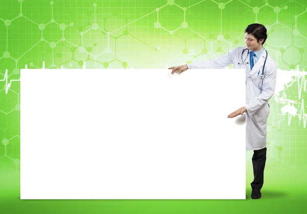 Doctor con banner en blanco — Foto de Stock