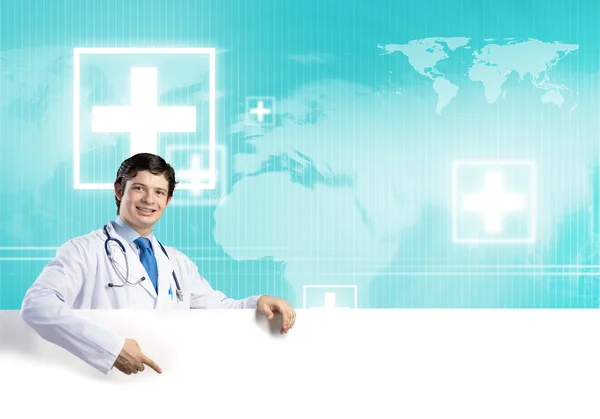 Doctor holding blank banner — Stock Photo, Image