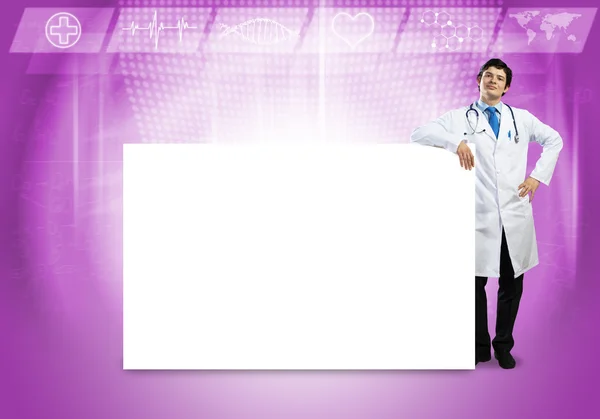 Doctor con banner en blanco — Foto de Stock