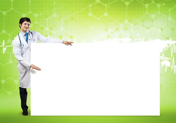 Doctor con banner en blanco — Foto de Stock