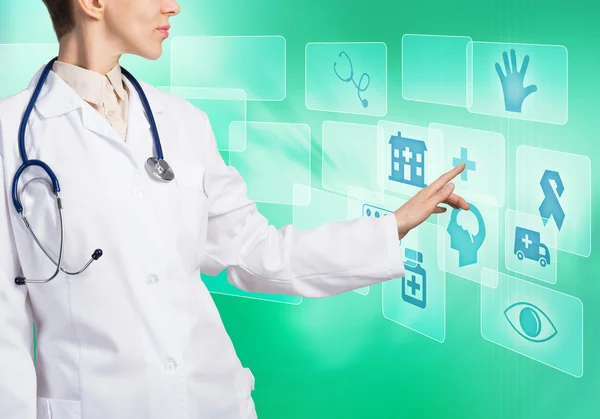Kvinnliga läkare röra ikonen — Stockfoto