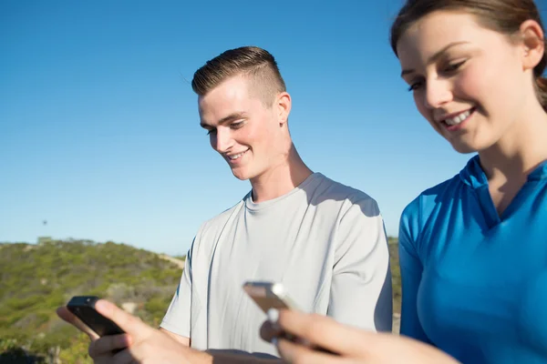 Young active couple of joggers — Stock Photo, Image