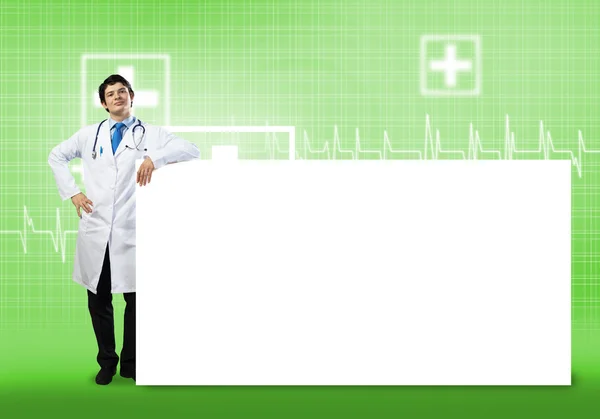 Medico con banner in bianco — Foto Stock