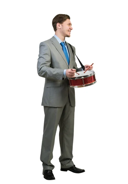 Businessman playing drums — Stock Photo, Image