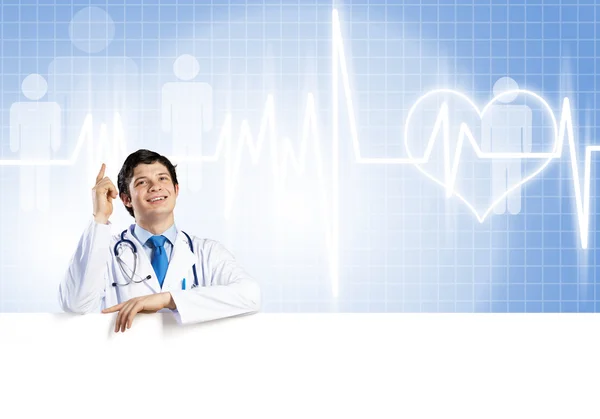 Doctor holding blank banner — Stock Photo, Image