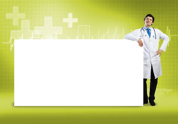 Doctor con banner en blanco —  Fotos de Stock