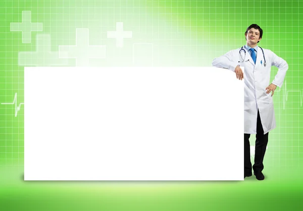 Medico con banner in bianco — Foto Stock