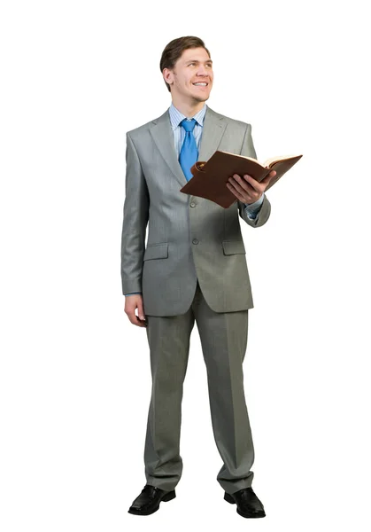 Joven hombre de negocios leyendo libro — Foto de Stock