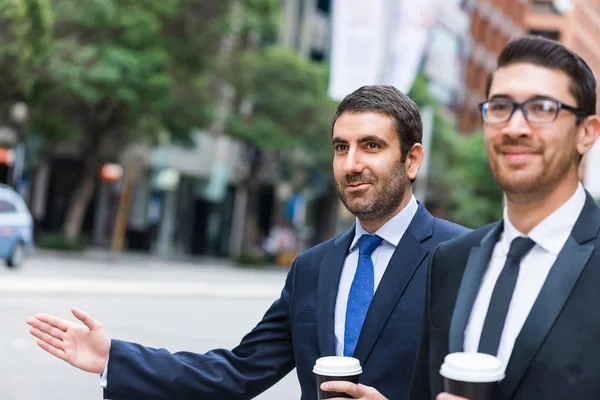 Businessmen stopping car — Stock Photo, Image