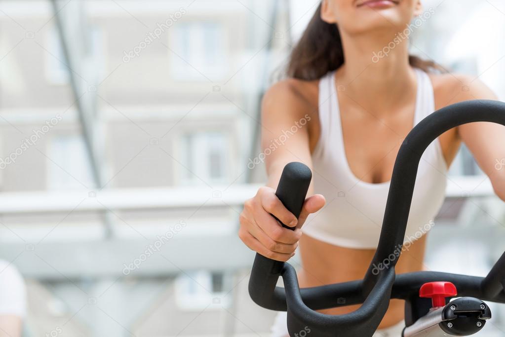 people exercising on bike