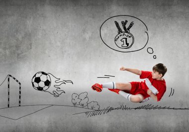 çocuğun futbol oynama