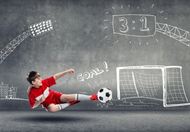çocuğun futbol oynama