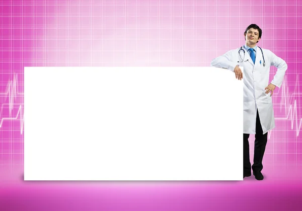 Doctor with blank banner — Stock Photo, Image