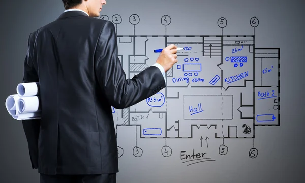 Engineer drawing building plan — Stock Photo, Image