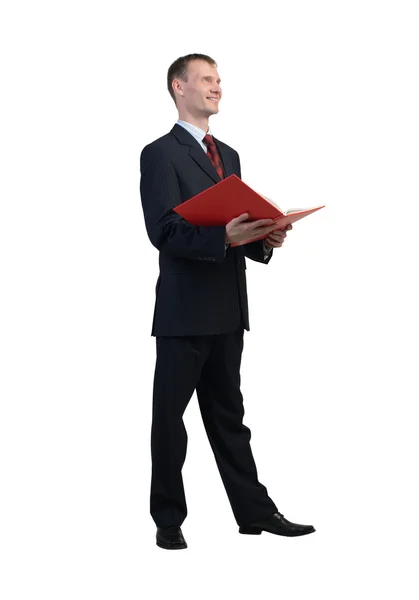 Empresario leyendo libro rojo — Foto de Stock