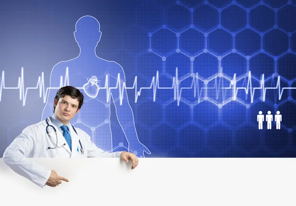 Doctor sosteniendo banner en blanco — Foto de Stock