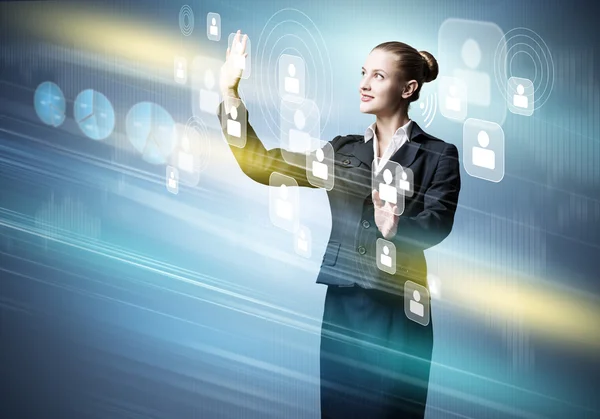 Businesswoman with virtual panel — Stock Photo, Image