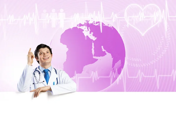 Doctor holding blank banner — Stock Photo, Image