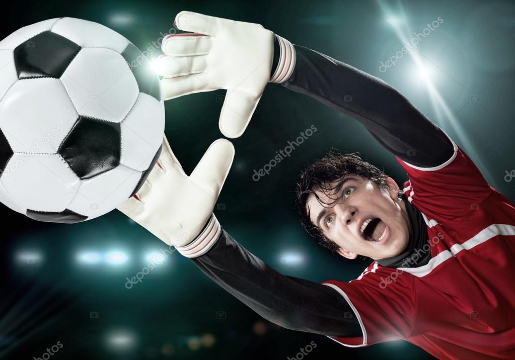 goalkeeper in jump catching ball