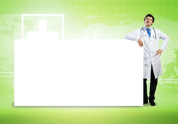 Doctor con banner en blanco —  Fotos de Stock