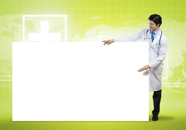Medico con banner in bianco — Foto Stock