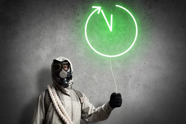 Man in respirator with balloon — Stock Photo, Image